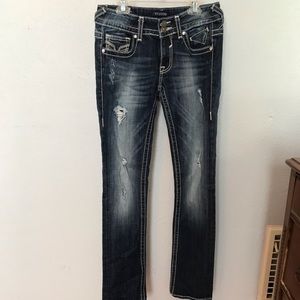 Slightly distressed blue jeans